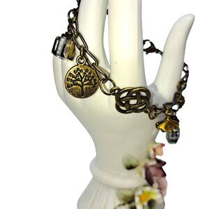 Celtic knot with charms bronze tone